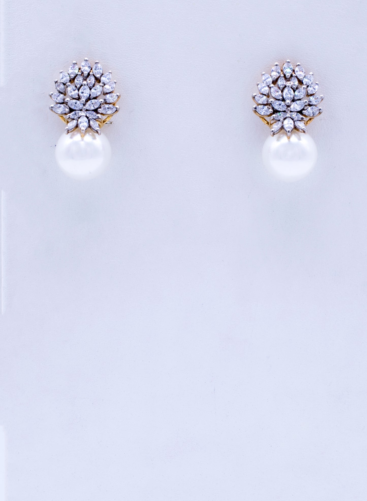 Elegant Pearl and Zircon Ear Studs